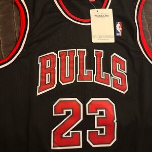 Mitchell & Ness Bulls Jersey in Black with Red Accents